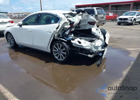 2022 Mazda Mazda3 Premium from USA, damaged, VIN 3MZBPBDL2NM309748